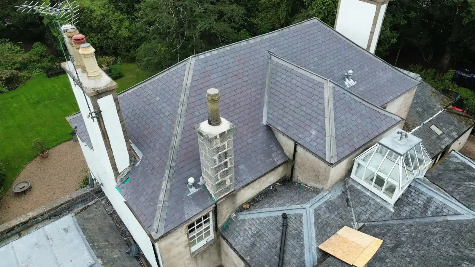 Aerial view of the slate roof with its lantern and chimney stacks